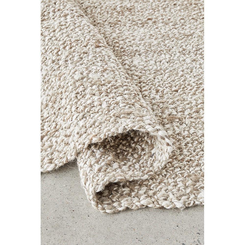 Harlow Parker Silver Rug featuring boucle texture in cream, beige and taupe on light gray background, hand-woven wool