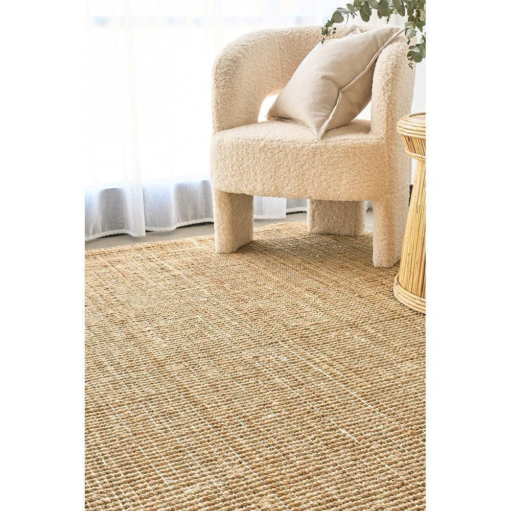 Madras Marlo Natural Jute Rug featuring textured woven pattern in beige, tan and cream on ivory background, hand-loomed jute