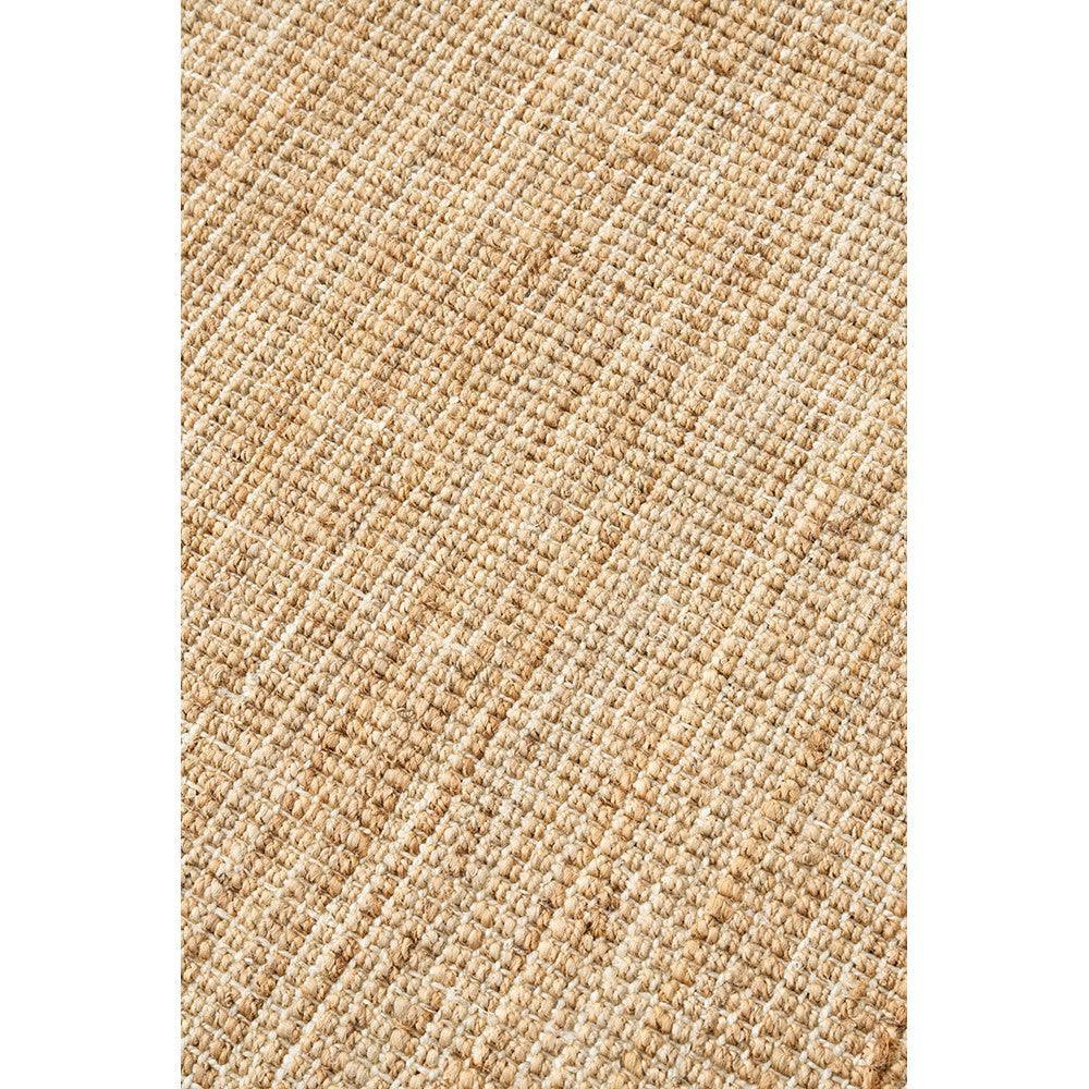 Madras Marlo Natural Jute Rug featuring woven textured pattern in beige, tan and light brown on natural background, hand-woven jute