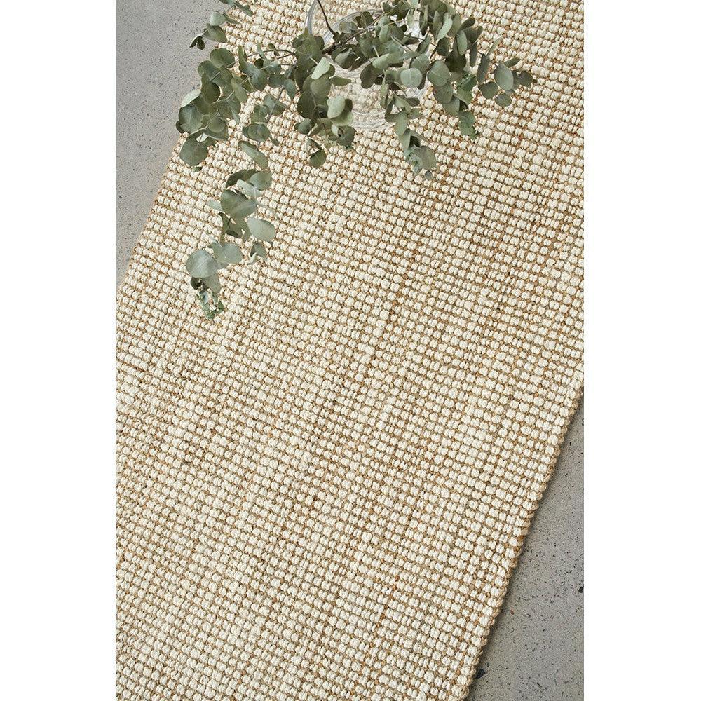 Madras Marlo White Jute Runner Rug featuring woven texture in natural beige, ivory and cream on grey concrete background, handwoven jute