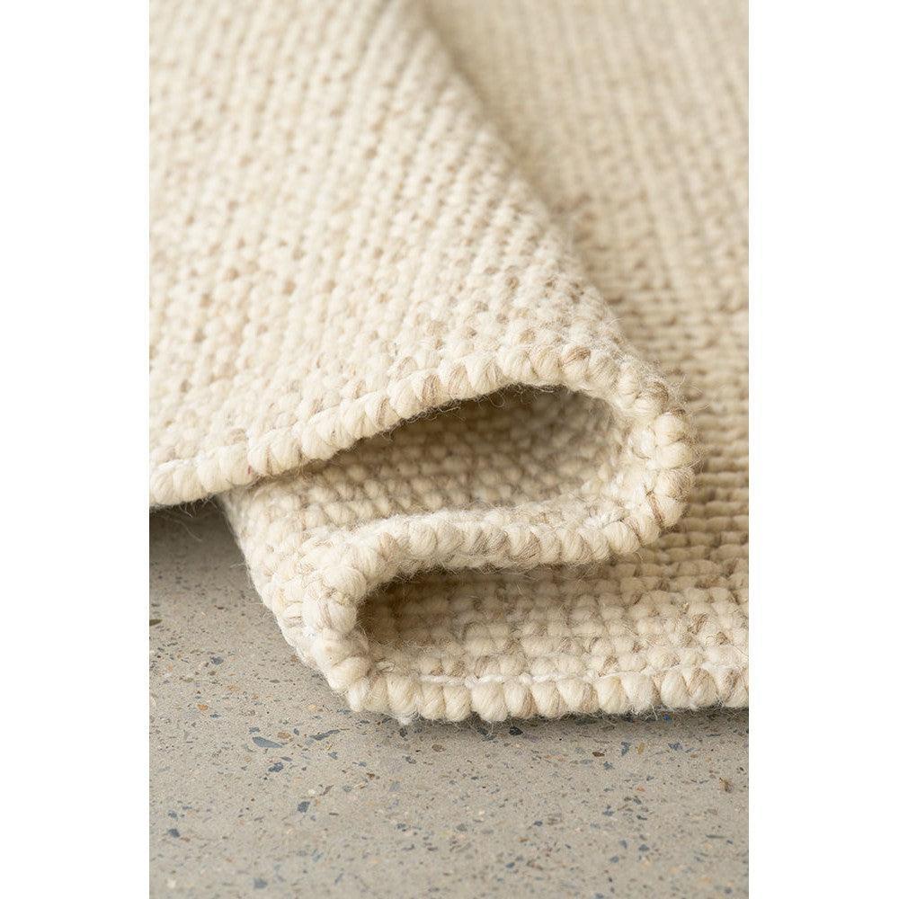 Madras Parker Cream Wool & Jute Rug featuring a textured woven pattern in cream and ivory on warm beige, hand-loomed wool & jute