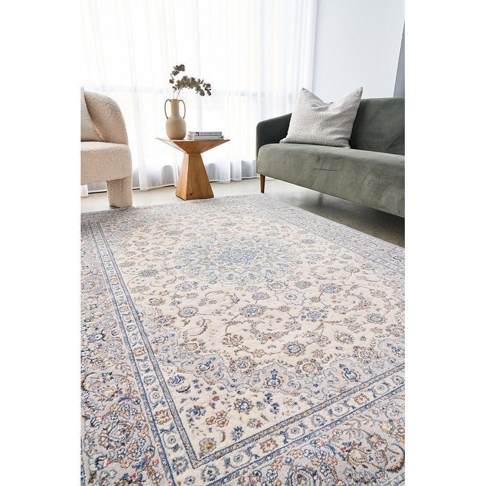Melody Kashan Ivory Wool Rug featuring ornate Persian floral pattern in ivory, pale blue and taupe on ivory background, hand-tufted wool
