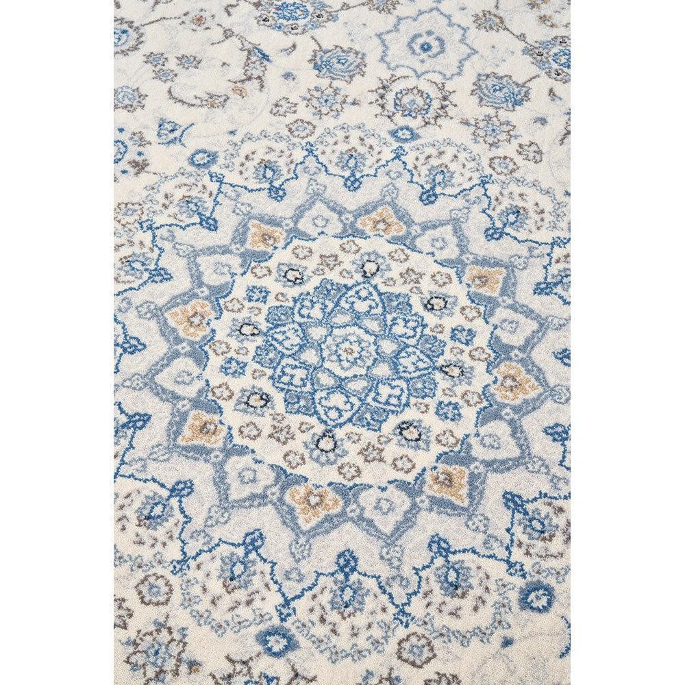Melody Kashan Ivory Wool Rug featuring Persian medallion in blue, light blue and tan on ivory background, hand-tufted wool