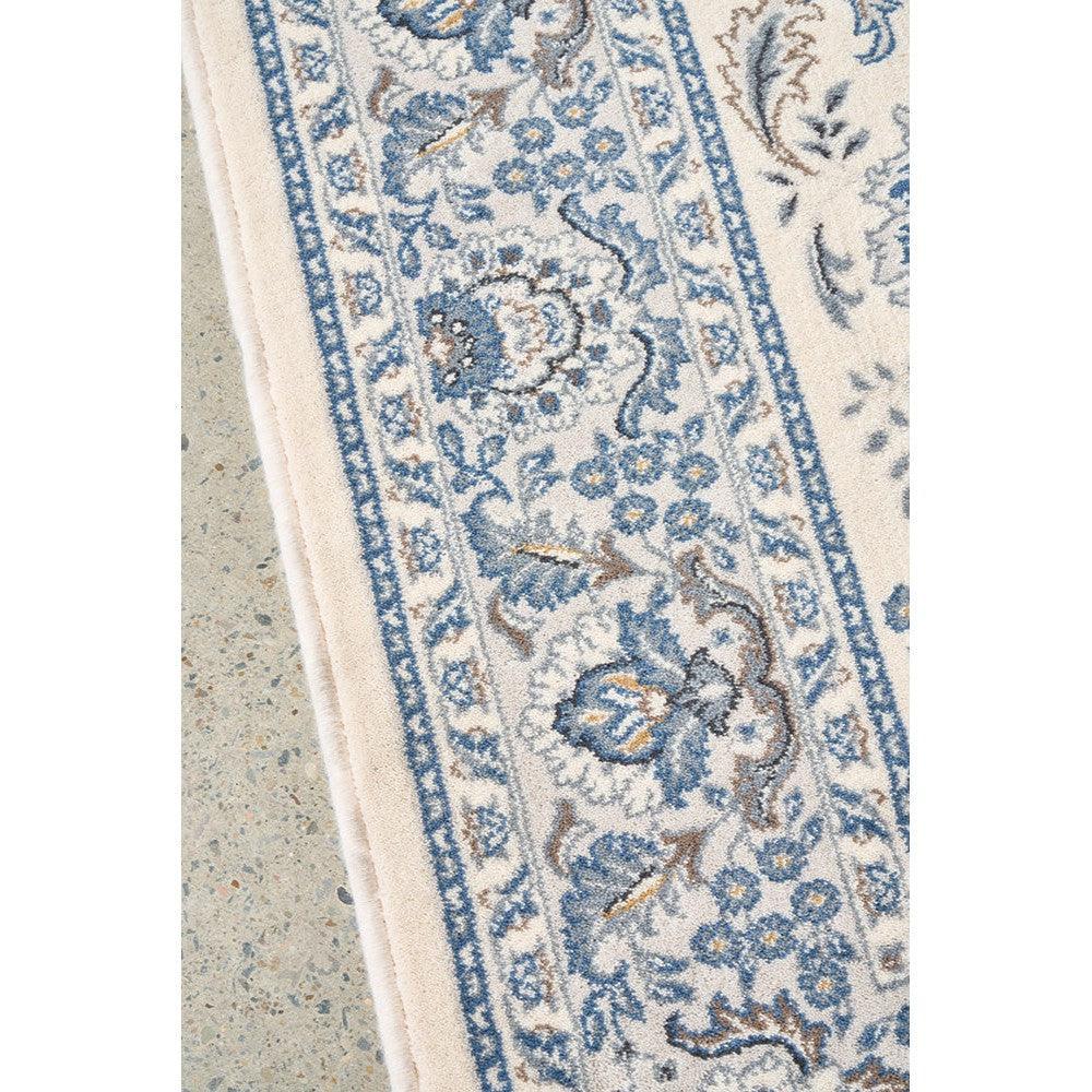 Melody Nain Cream Wool Rug featuring Persian floral border in blue, cream, taupe on ivory background, hand-tufted wool