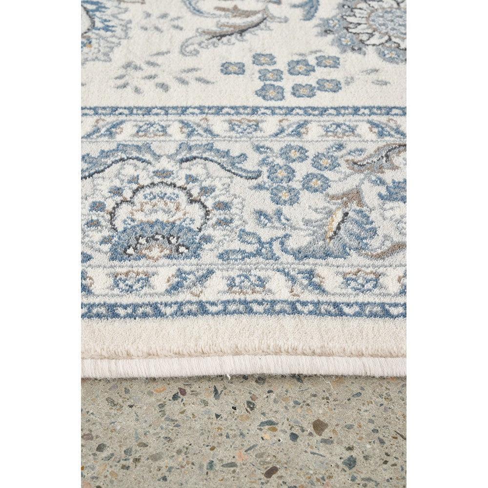 Melody Nain Cream Wool Rug featuring Persian floral pattern in navy blue, light blue and cream on ivory background, hand-tufted wool