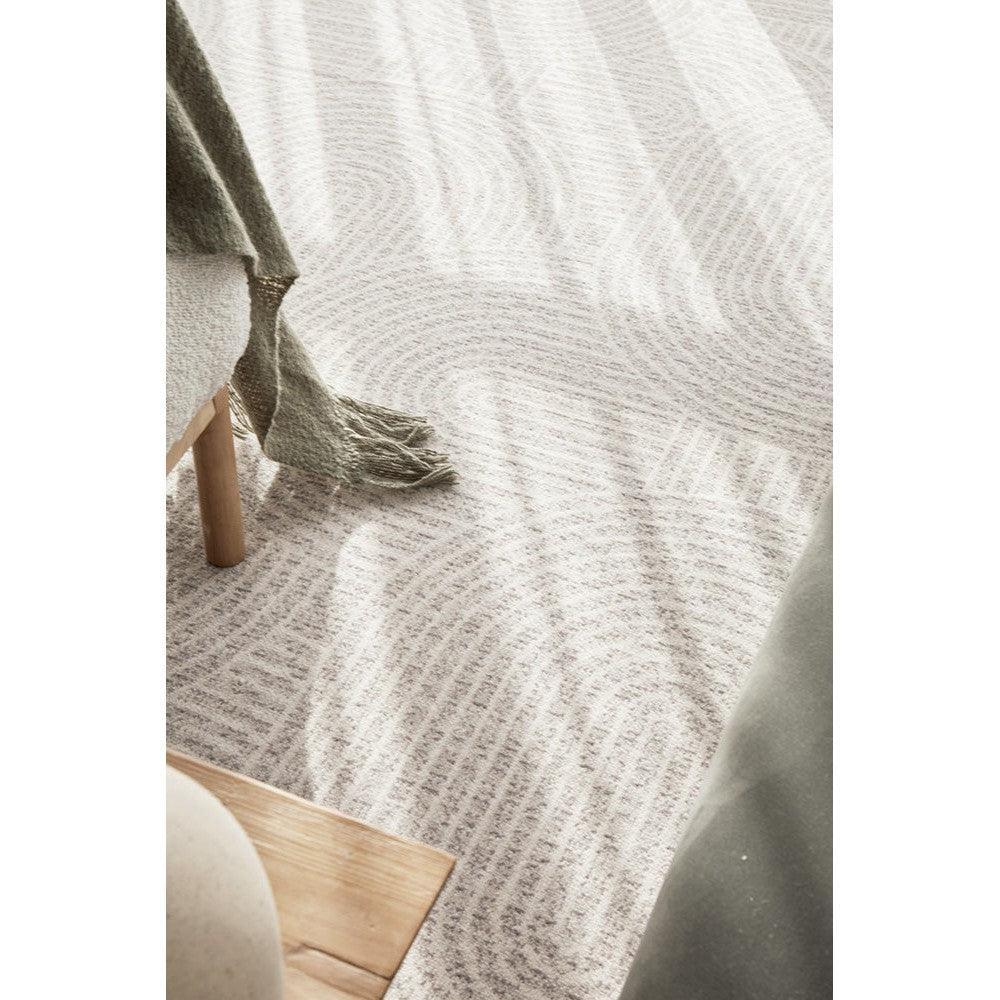 Prague Klarn Tan Rug featuring soft wavy stripe pattern in beige, taupe and cream on tan background, hand-tufted wool