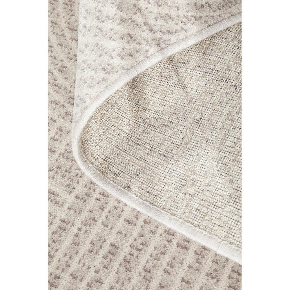 Prague Klarn Tan Rug featuring subtle textured pattern in tan, beige and cream on light beige background, machine-woven wool