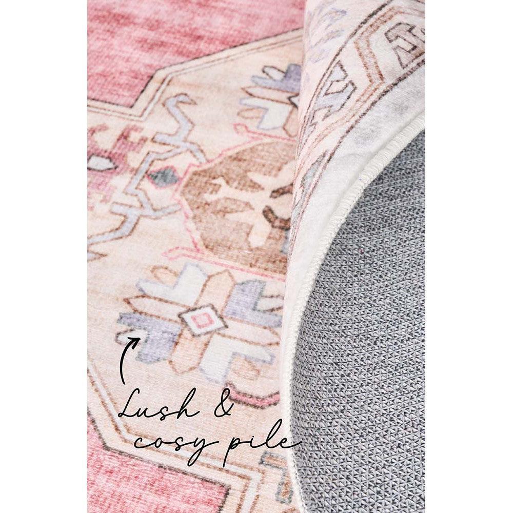 Revive Avril Rose Rug featuring geometric floral pattern in pink, blush, ivory on pale pink background, plush pile