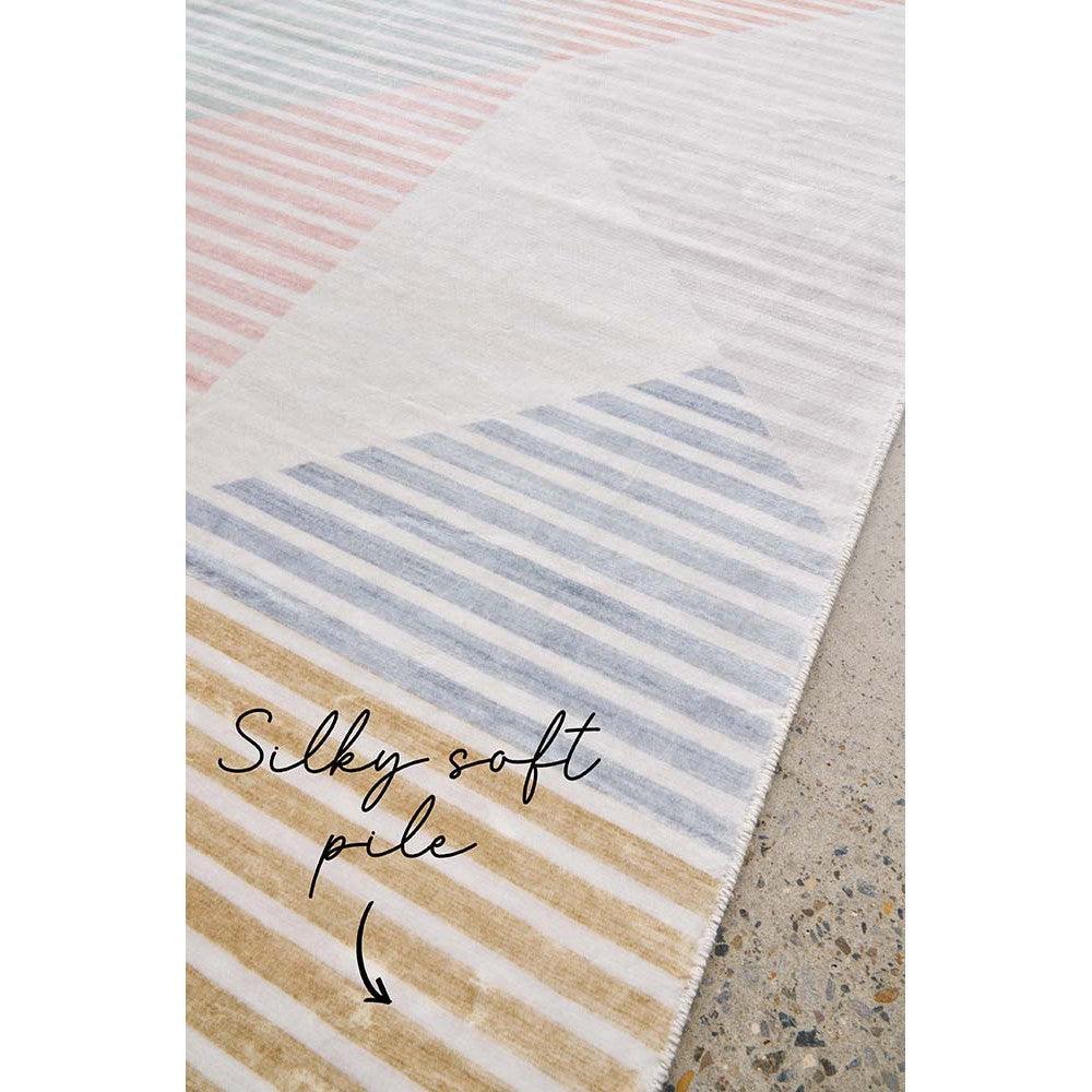 Revive Dali Pastel Rug featuring striped pastel pattern in pink, blue, ochre on ivory background, power-loomed polyester