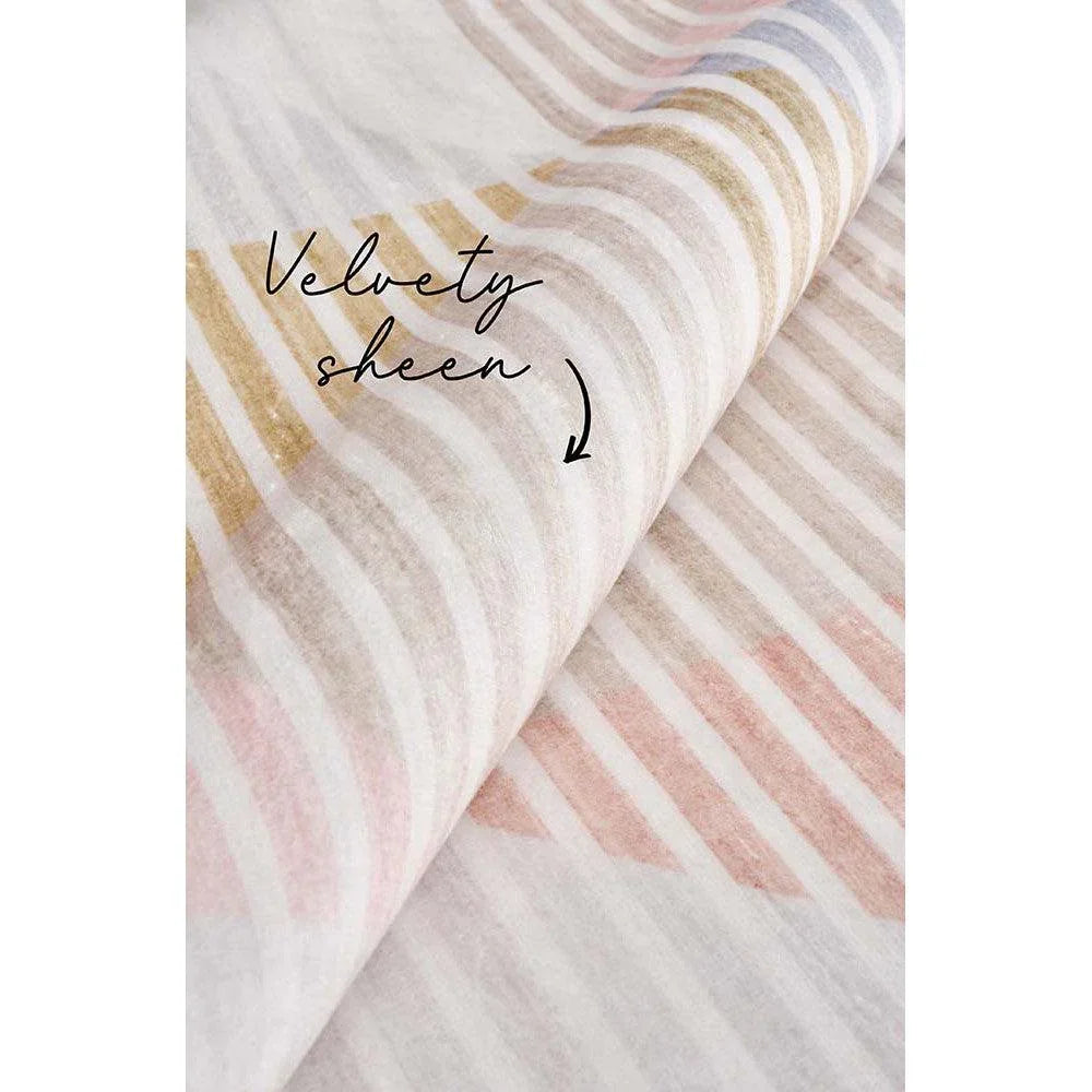 Revive Dali Pastel Rug featuring striped wavy pattern in pastel pink, peach, beige on ivory background, hand-tufted wool