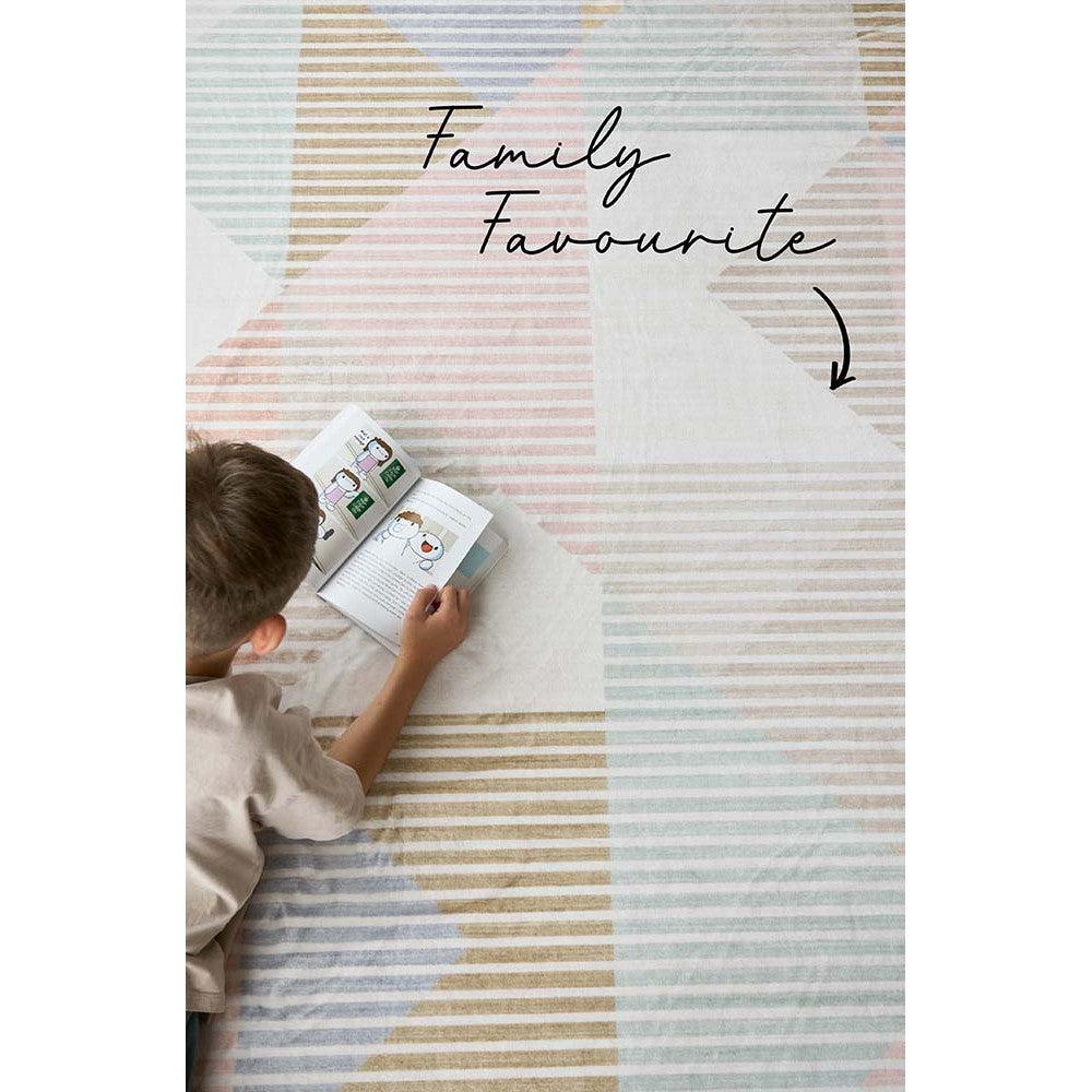 Revive Dali Pastel Rug featuring geometric star-and-stripe design in pastel pink, powder blue, sage, beige on cream background, hand-tufted wool