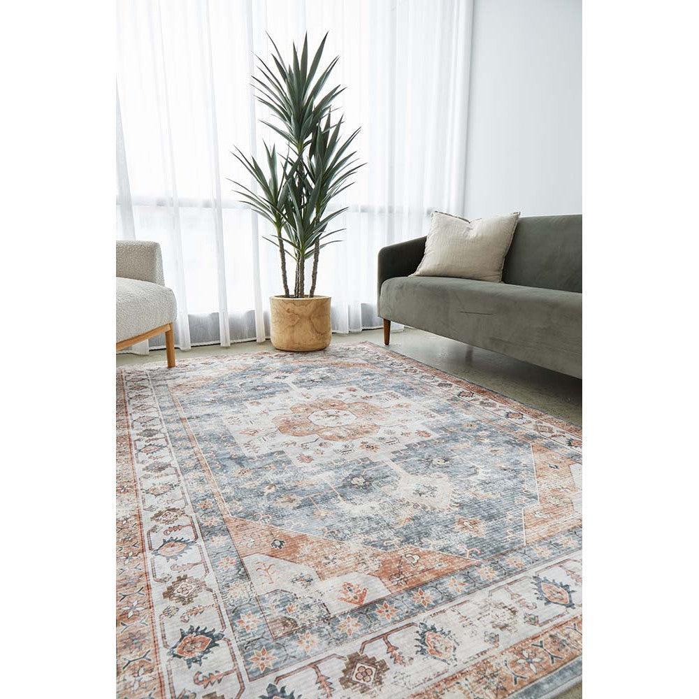 Revive Dawn Putty Rug featuring vintage oriental pattern in dusty blue, terracotta, ivory on putty background, hand-tufted wool