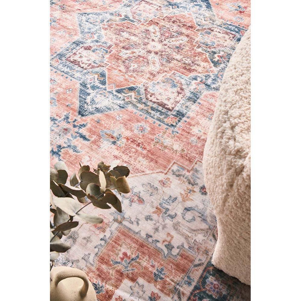 Revive Lila Rust Rug featuring distressed vintage pattern in coral pink, navy blue and ivory on cream, machine-woven polypropylene