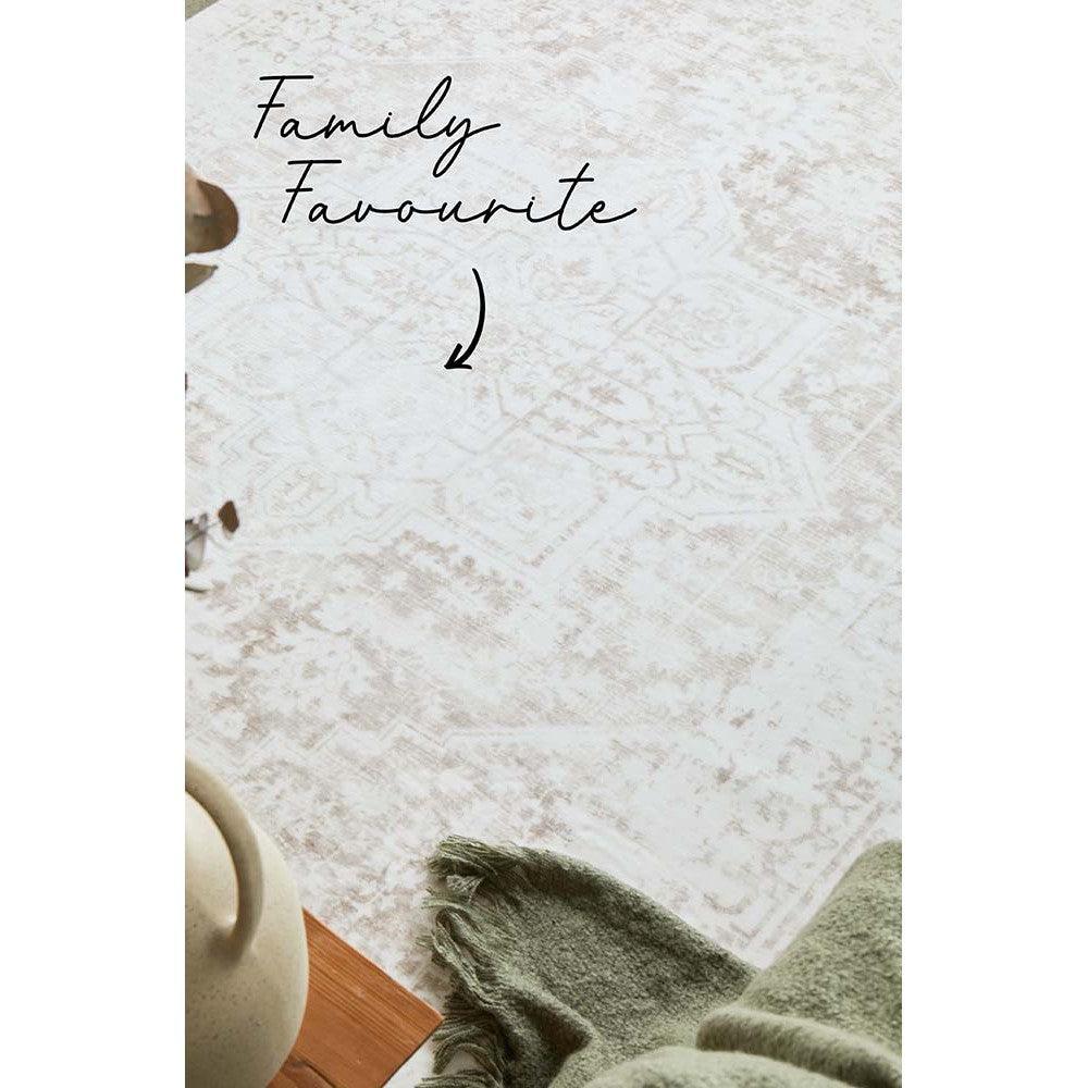 Revive Loni Natural Rug by Rug Culture featuring subtle distressed pattern in ivory and beige on cream background