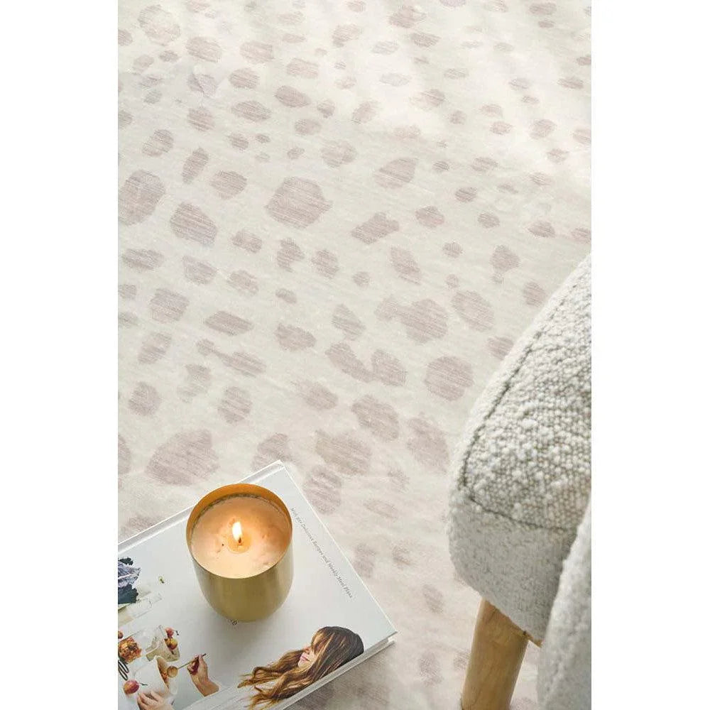 Revive Mila Natural Rug featuring a speckled spot pattern in dusty pink on cream background, hand-tufted wool