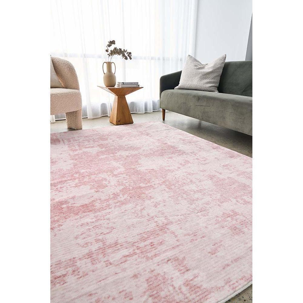Revive Muse Blush Rug featuring abstract distressed pattern in blush pink, pale pink and cream on light beige background, hand-tufted wool