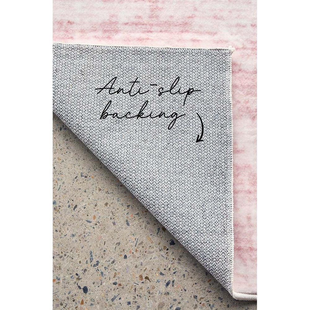 Revive Muse Blush Rug featuring speckled grey pattern on blush pink with anti-slip backing, Rug Culture