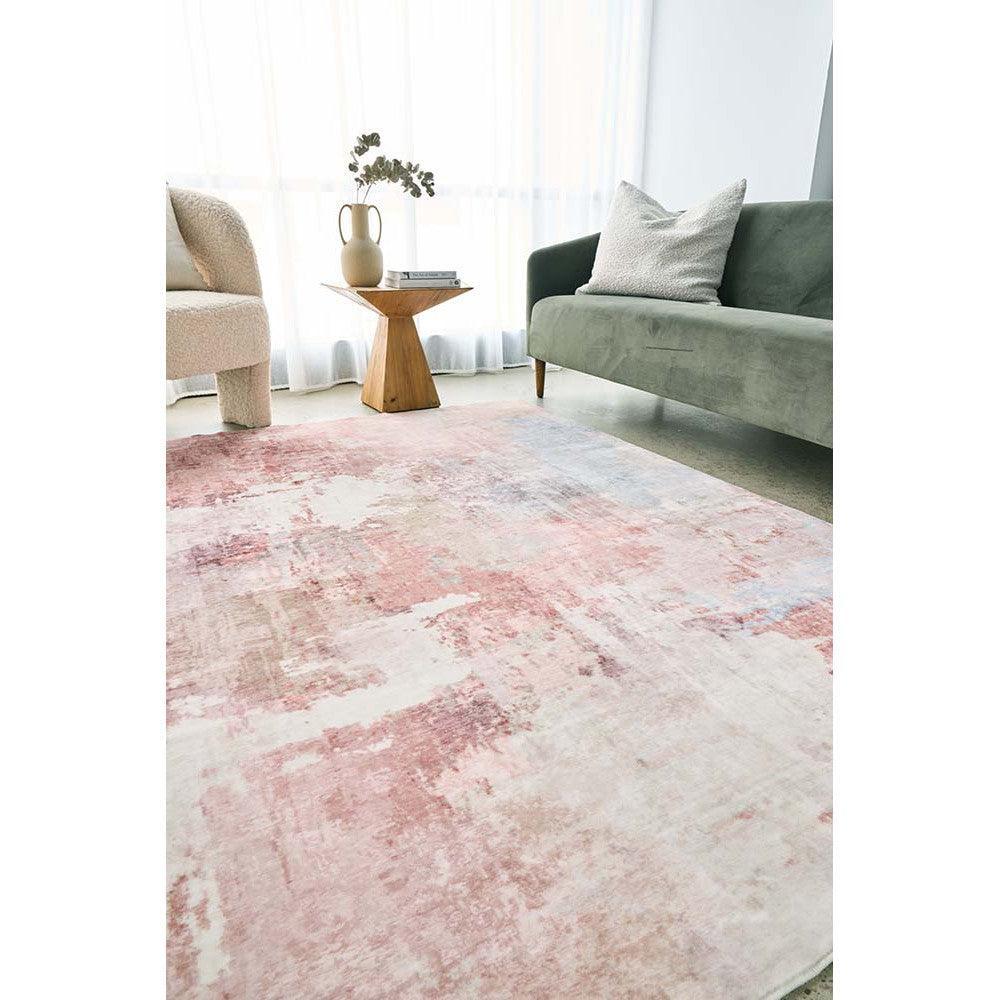 Revive Roxy Pastel Rug featuring abstract pattern in blush pink, peach, cream and light blue on ivory background, hand-tufted wool