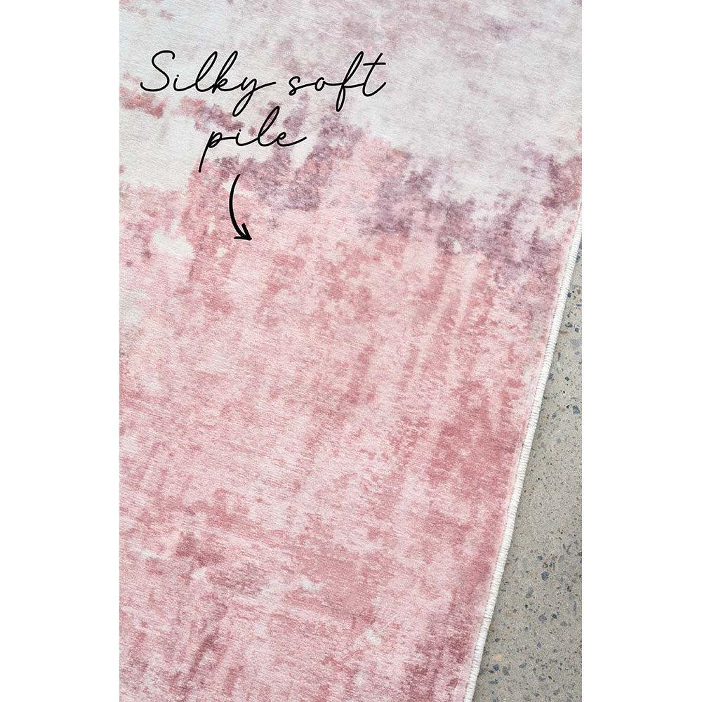 Revive Roxy Pastel Rug featuring soft pink gradient marbling in blush and ivory on grey background, hand-tufted wool