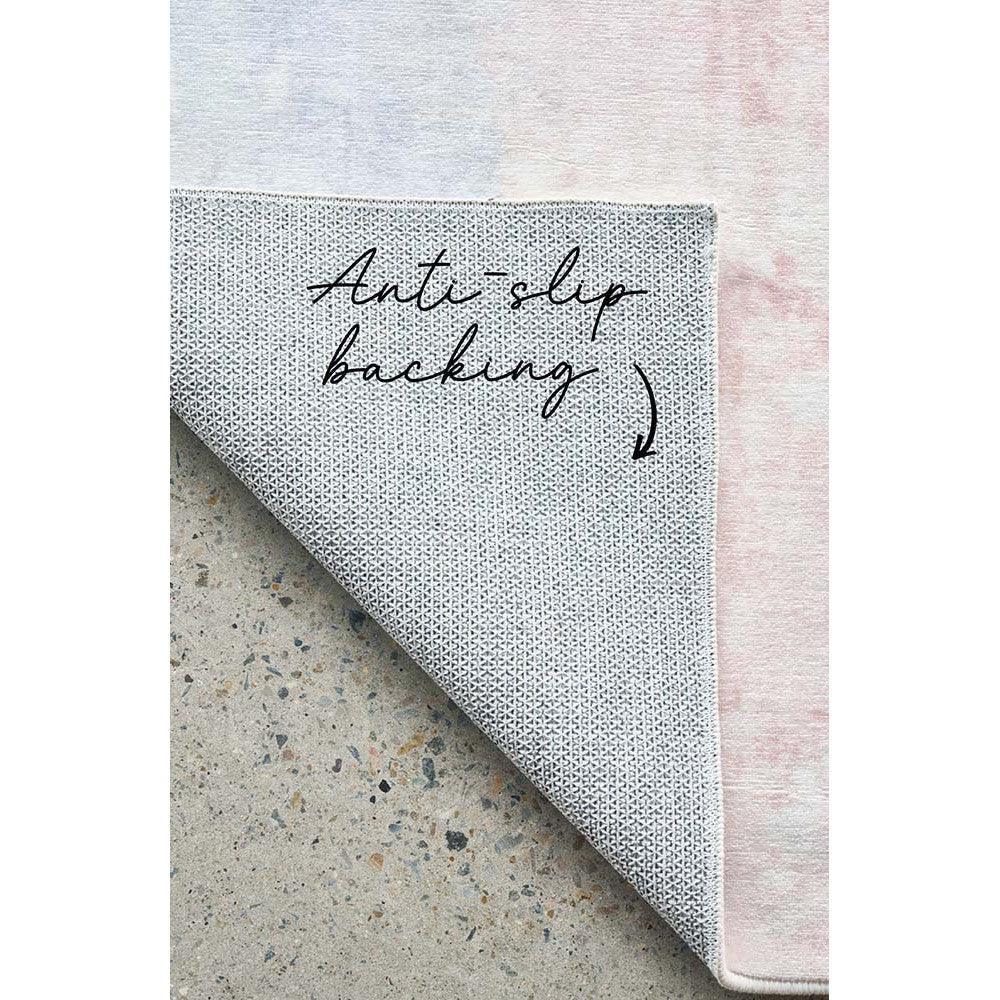 Revive Roxy Pastel Rug featuring gradient abstract pattern in blush pink, powder blue, cream on pale pink background, anti-slip backing