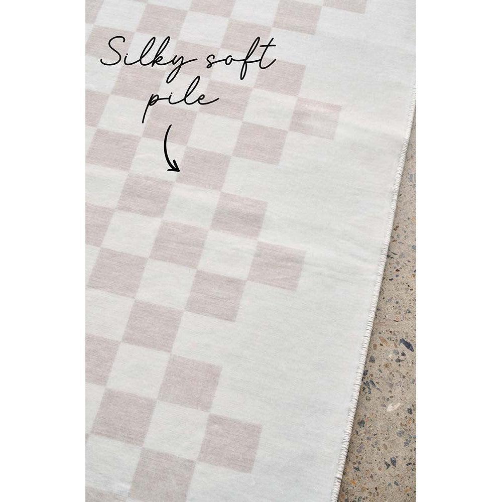 Revive Toshi Natural Rug featuring checkerboard pale pink and cream pattern on ivory background, hand-tufted wool