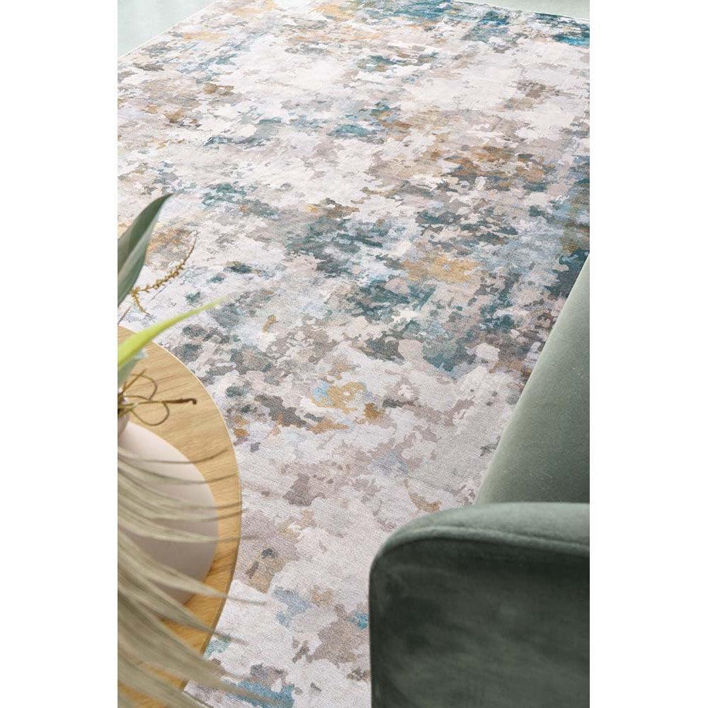 Revive Zane Marine Rug featuring abstract splash in navy blue, teal, beige and cream on light cream, hand-tufted wool